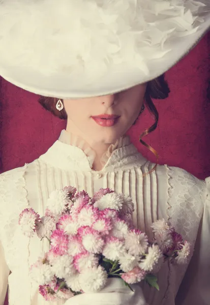 Belle donne rosse con bouquet Foto Stock Royalty Free