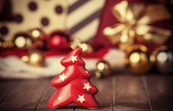 Bell tree és a karácsonyi ajándékokat, háttér — Stock Fotó