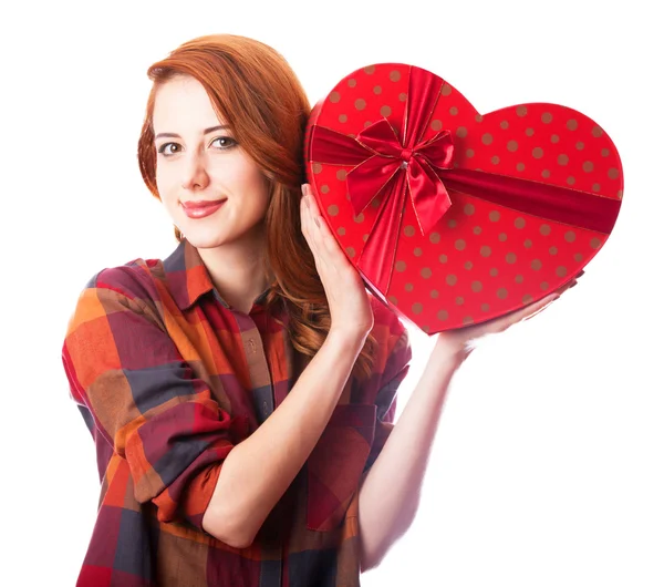Redhead girl with gift. — Stock Photo, Image