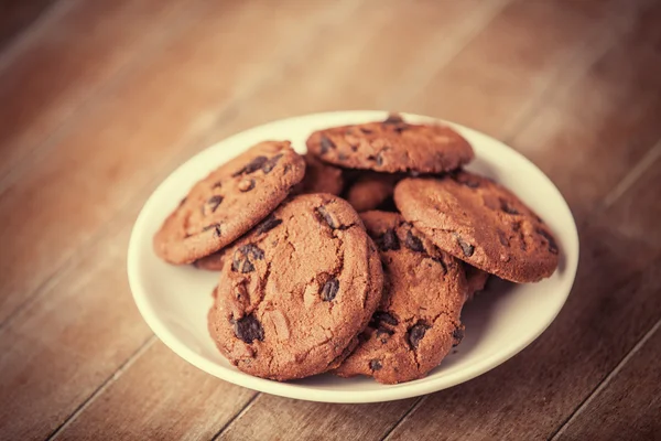 Cookies at wooden background — Stock Photo, Image
