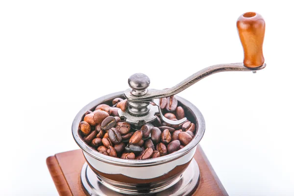 Coffee grinder and coffee beans isolated on white background — Stock Photo, Image