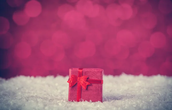 Gift box on snow — Stock Photo, Image