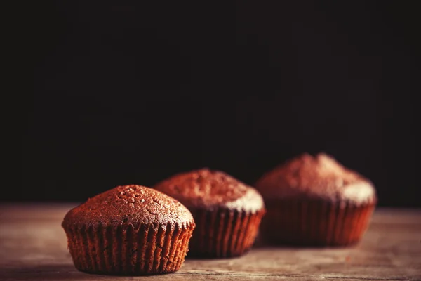 Muffin on wooden table. — Stock Photo, Image