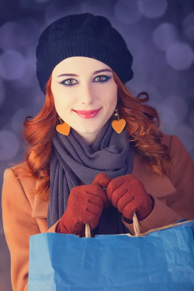 Redhead with with bag. — Stock Photo, Image