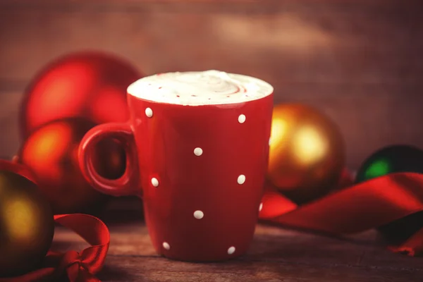 Cup of coffee with gifts. — Stock Photo, Image