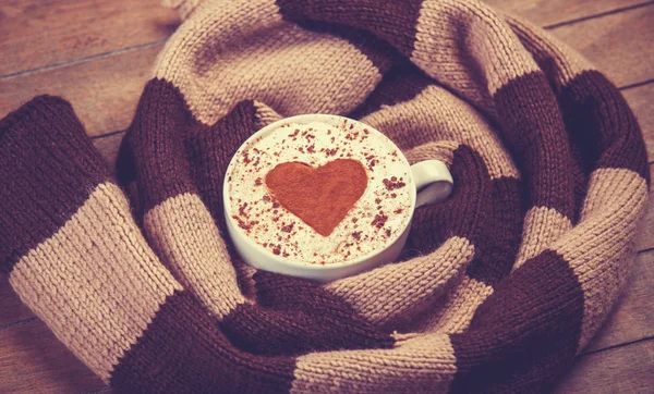 Cup with coffee and scarf. — Stock Photo, Image