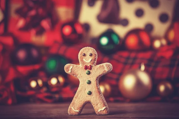 Cookie man and gifts. — Stock Photo, Image