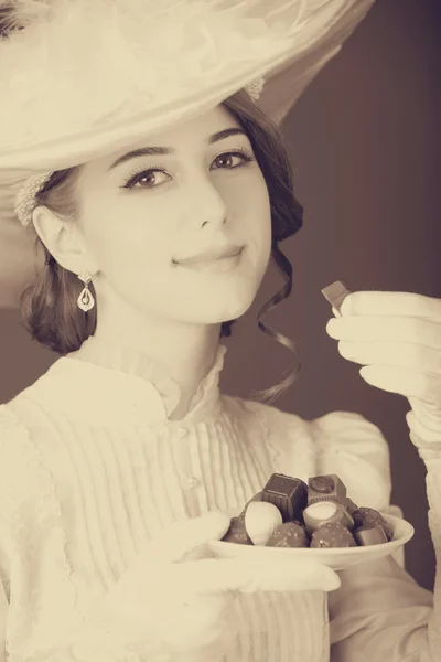 Schöne Frauen mit Süßigkeiten. — Stockfoto