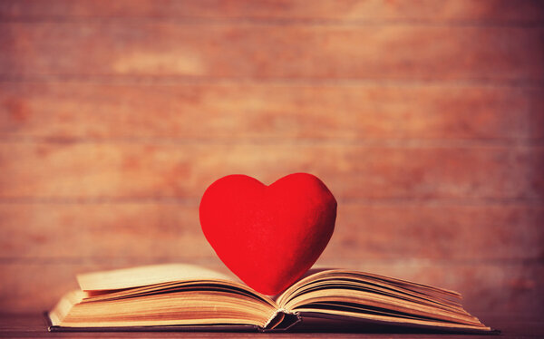 Heart shape and retro book.