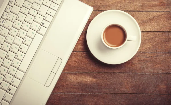 Cup of the coffee on a wooden table. — Stock Photo, Image