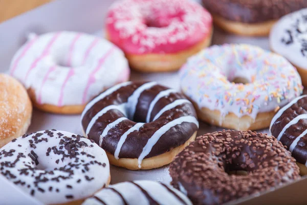 Donuts em caixa . — Fotografia de Stock