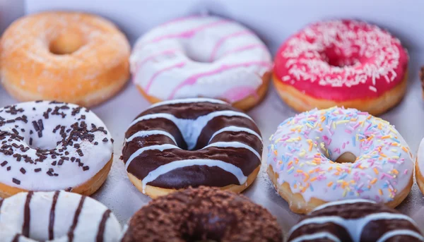 Donuts em caixa . — Fotografia de Stock