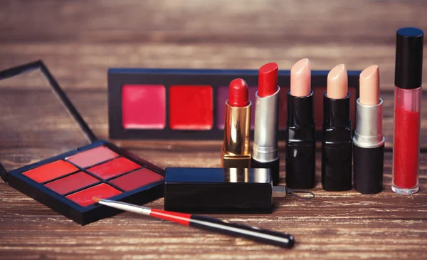 Cosmetics on wooden table. — Stock Photo, Image