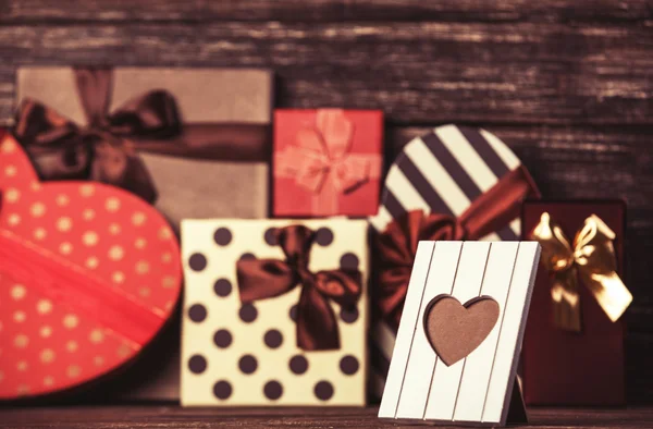 Frame on gifts background. — Stock Photo, Image