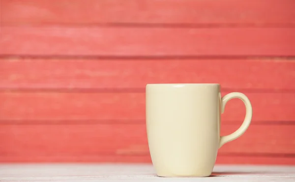 Té o taza de café en mesa de madera . — Foto de Stock