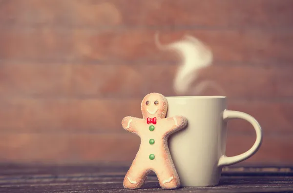 Cookie man and cup o hot chocolate. — Stock Photo, Image
