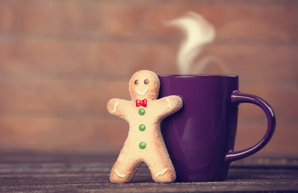 Cookie man and cup o hot chocolate. — Stock Photo, Image