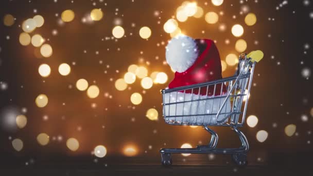 Kerstman Hoed Winkelwagen Kerstverlichting — Stockvideo