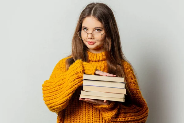 Beautiful Girl Glasses Yellow Sweater Books White Background — Foto Stock