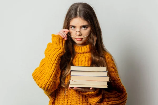 Beautiful Girl Glasses Yellow Sweater Books White Background — Stockfoto