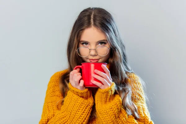 Beautiful Girl Glasses Yellow Sweater Red Mug White Background — Fotografia de Stock