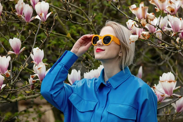 Beautiful Blond Woman Sunglasses Blue Shirt Next Magnolia Tree Spring — Stock Photo, Image