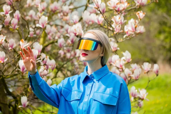 Stylish Woman Glasses Blue Shirt Glasses Magnolia Tree Spring Time — Foto de Stock