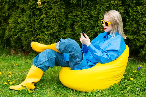 Stylish Ukrainian Girl Blue Shirt Yellow Boots Holds Mobile Phone — Stock Photo, Image