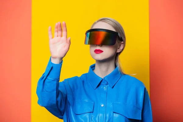 Stylish Woman Blue Shirt Glasses Yellow Background — Stock Photo, Image