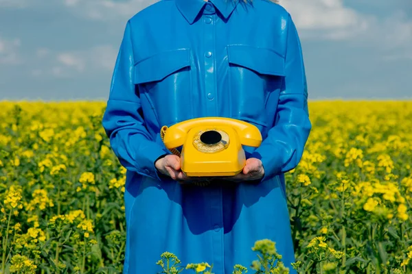 Ukrainian Woman Yellow Telephone Rapeseed Field Spring Time — Stock Photo, Image
