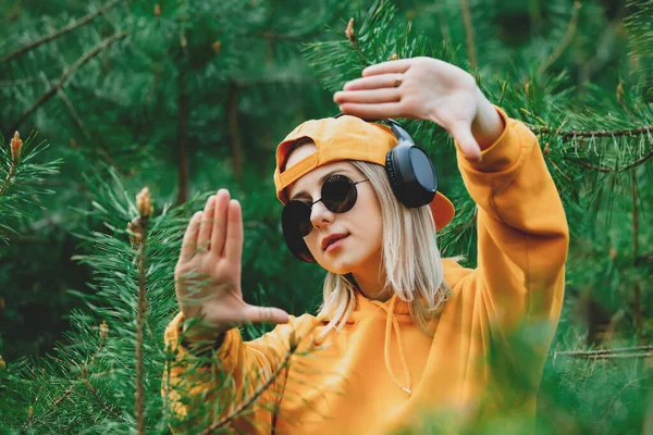 Stylish Girl Hoodie Listen Music Headphones Pine Tree Forest — Stock Photo, Image