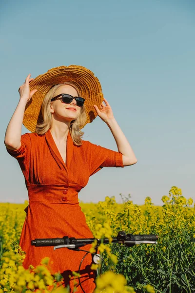 Beautiful Blond Girl Vintage Dress Sunglasses Bicycle Rapeseed Field Spring —  Fotos de Stock
