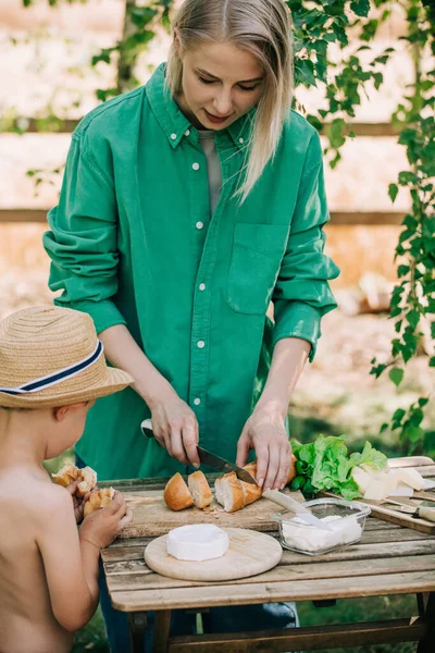 Stylish Woman Green Shirt Make Snack Bread Cheese Table Outdoor — Fotografia de Stock