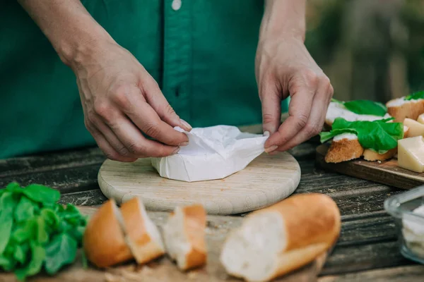 Stylish Woman Green Shirt Make Snack Bread Cheese Table Outdoor —  Fotos de Stock
