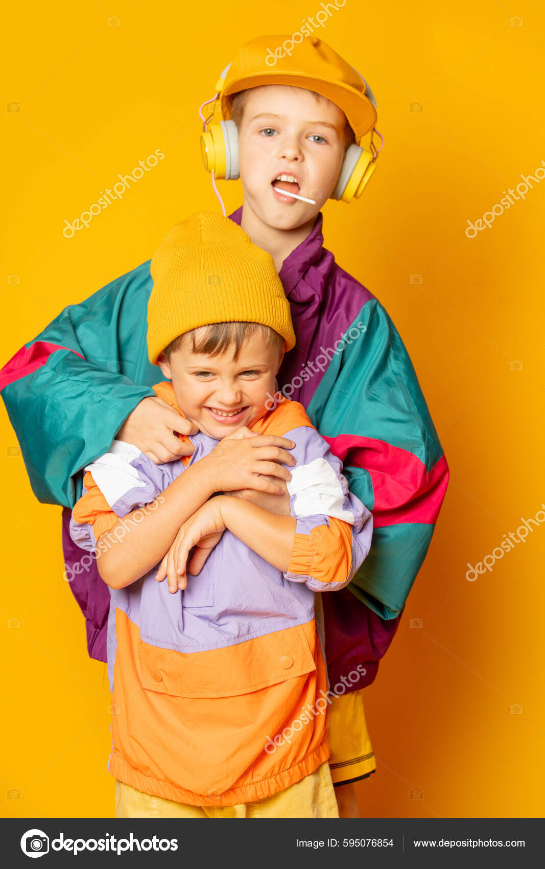 Two Kids Stylish Vintage 80S Clothes Have Fun Yellow Background