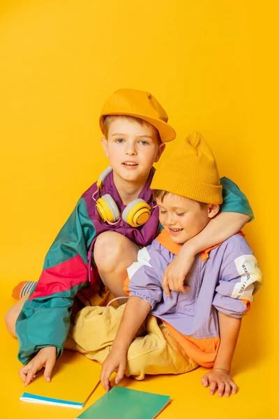 Two Kids Stylish Vintage 80S Clothes Have Fun Yellow Background — Zdjęcie stockowe
