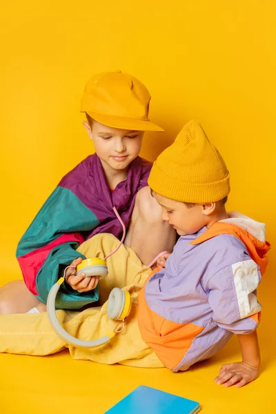 Two Kids Stylish Vintage 80S Clothes Have Fun Yellow Background — Zdjęcie stockowe