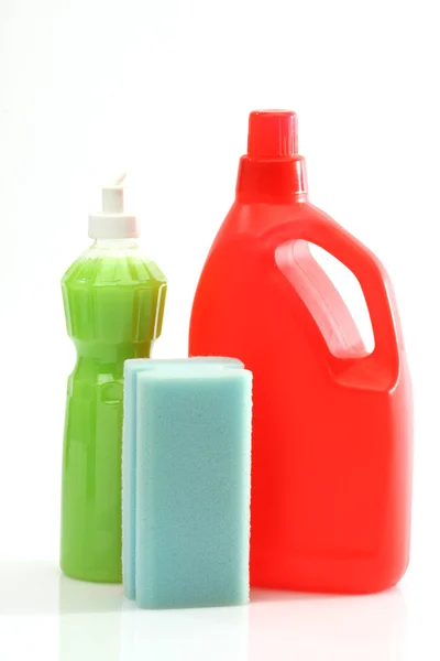 Detergent bottles and sponge — Stock Photo, Image