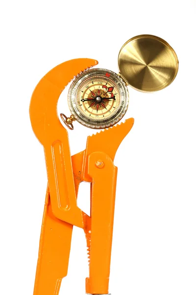 Ключ и компас — стоковое фото