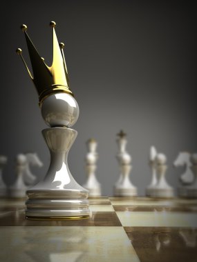 altın bir taç piyon