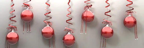 Christmas balls hanging with ribbons — Stock Photo, Image