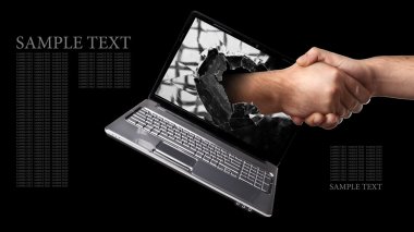 bir el, sağ el sallamak için laptop ekran dışında gelir