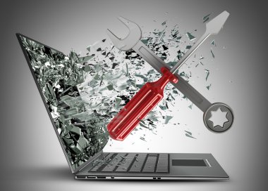 Screwdriver and Wrench exit by a monitor of laptop screen
