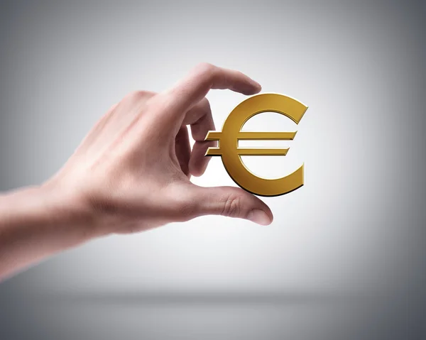 Hand holding Golden Euro simbol — Stock Photo, Image