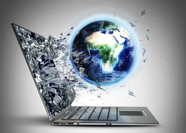 Globe exit by a monitor of laptop screen — Stock Photo, Image