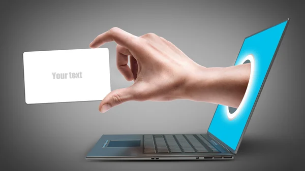 Hand with the empty card, come out from a screen of a laptop — Stock Photo, Image