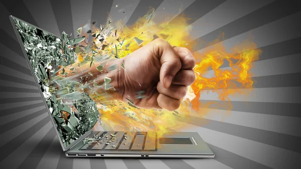 Fist on fire from laptop — Stock Photo, Image