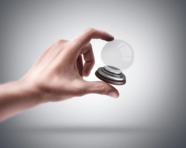 Mão segurando bola de cristal vazio — Fotografia de Stock