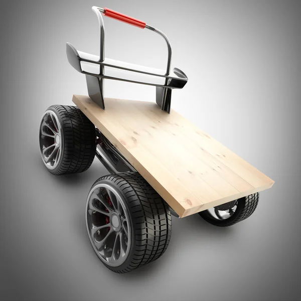 Cardboard with big car wheel. — Stock Photo, Image