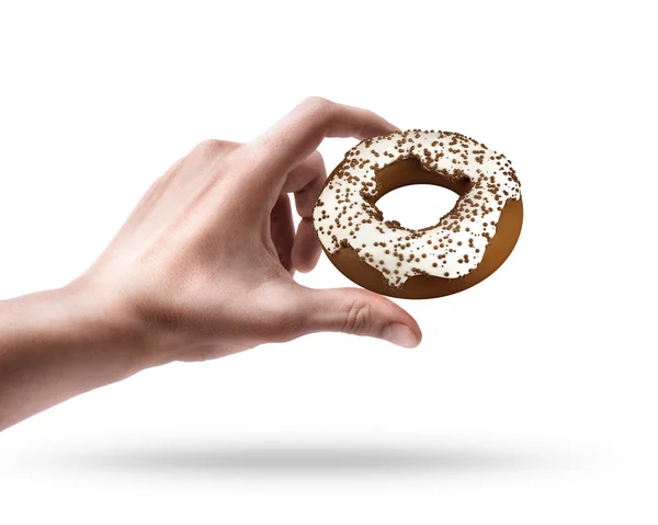 Hand holding doughnut — Stock Photo, Image